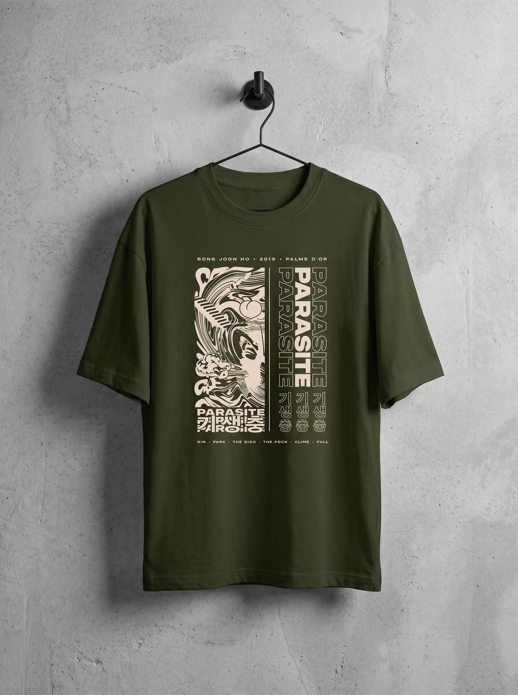 Bold acid-collage screen print inspired by Parasite 2019 — Korean typography and poster art on olive green oversized tee