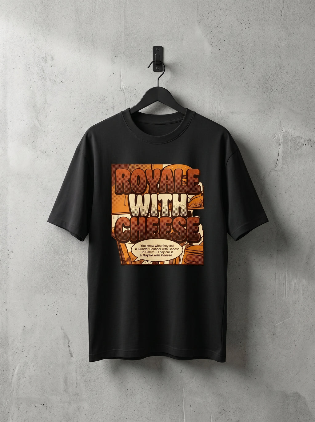 Culture Canvas black oversized graphic tee — Royale With Cheese pop-art comic print in amber and brown, Pulp Fiction fan art tribute, 240 GSM cotton
